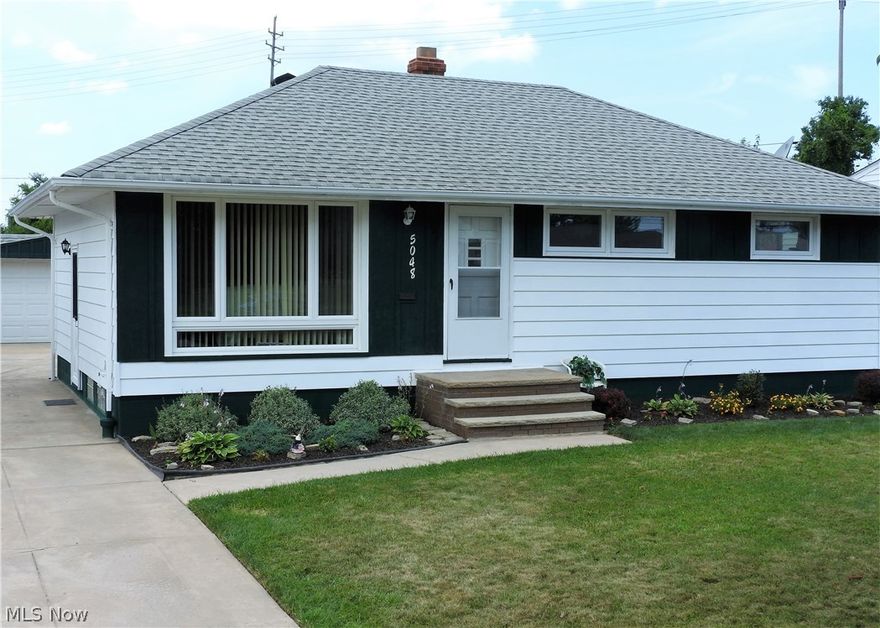 Darling 3 bedroom - 2 FULL bathroom  ranch has it all! Finished basement with bar * Newer windows, roof, HVAC, HWT * new garage door and opener * all appliances stay including W/D * hardwood floors * 2 car garage with covered patio * Cute and cozy!