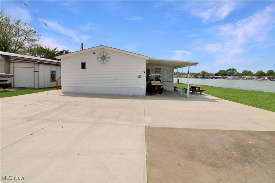 Waterfront ranch on Catawba with 60+ ft dock at the door! 3-bedroom, 2-bathroom split floor plan. Completely updated kitchen. Plus, a brand-new, extended paved driveway to park your water toys. Enjoy the tranquil harbor scenery of boats passing by from your waterfront sunroom. You will enjoy every memory of Lake Erie Living. Located near parks, marinas, vacation activities, shopping, dining, and fun in the sun!  Call today to take a look.