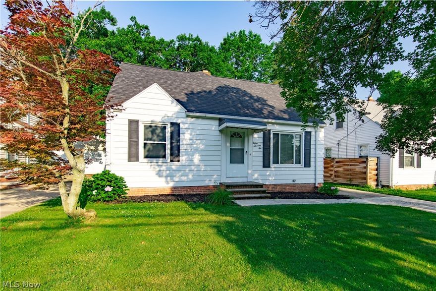 Awesome, move in condition Bungalow in Mayfield Heights! The large 22' x 16' great room addition, with vaulted ceilings and skylights, really makes this home desirable. There is also a wood-burning fireplace with gas starter, and slider to a welcoming 20' x 12' partially covered privacy deck for those relaxing evenings. The kitchen has newer cabinets, a snack bar, and vaulted ceiling with skylight. Refrigerator, gas stove, microwave, dishwasher, and disposal are included. New carpeting in family room and throughout living room (2019), hall, and stairs to upper level (2019). Refinished hardwood floors in both bedrooms on main level. There’s also hardwood flooring under carpet in living room and hall. There are 3 full baths, one on every level. The master bedroom on the second level has a glamour bath with custom shower, jetted tub, Marble floors, and skylights. The lower level also has a full bath. Washer and dryer are included. All newer windows and doors. New dimensional roof (tear of