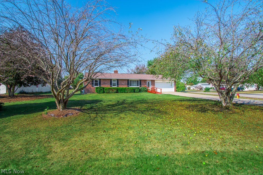 Large Ranch home on corner lot with fully finished basement. The basement has 3 finished rooms and an additional full bath. There is a large family room off the kitchen that overlooks the backyard and patio. The spacious master offers a half bath and walk in closet. This home is close to Jackson high school and shopping in town.