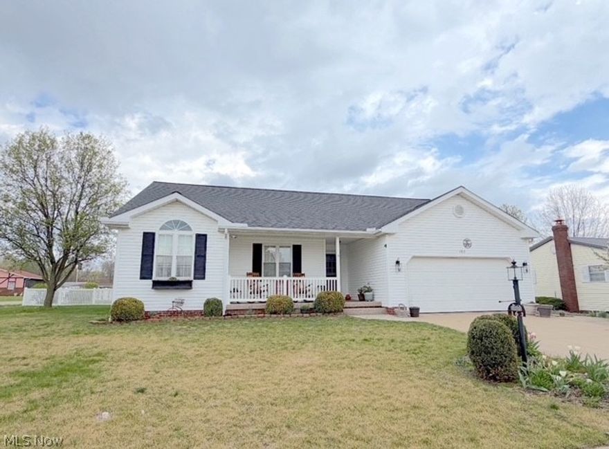 Welcome to this beautifully maintained ranch, perfectly positioned on a spacious 90x100 corner lot in a highly desirable location. As you step inside you will be impressed by an inviting open-concept layout featuring 3 bedrooms, 2.5 baths, a first-floor laundry room, and an attached 2-car garage with a separate workshop. The living room has cathedral ceilings, creating an airy, welcoming space ideal for relaxing or entertaining. The kitchen has been thoughtfully updated with new countertops, a convenient breakfast bar, and comes complete with all of the appliances. Enjoy meals in the dining area with easy access through patio doors to a 12x16 screened-in porch, perfect for morning coffee or evening gatherings. The private primary suite offers his and her closets and an en-suite bath with a double vanity and walk-in shower. The full basement already includes a half bath and offers excellent potential to be finished for additional living space. Recent updates provide peace of mind, including a new roof, central air system, and a gas hot water tank. Outside is a nicely landscaped fenced in level lot. This home is in move in ready condition. This is your opportunity to make it yours!