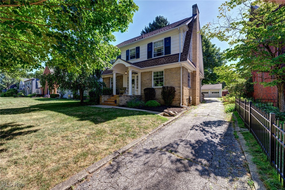 Dont miss this very spacious center hall colonial nestled on the sought after Castle Boulevard! Charming and well maintained original features as well as tasteful and stylish updates throughout. Welcoming foyer is flanked by a large living room with beautiful moulding and fireplace. Dining room opens to the well appointed kitchen with plenty of cabinets and counter space. Off the back entrance you'll enjoy the convenience of a mudroom and first floor half bath. The beautiful hardwood floors are continued upstairs with a very spacious primary bedroom boasting a large en suite bathroom and walk in closet! 2 additional spacious bedrooms with great closet space, 2 linen cabinets, and a charming full guest bath. Third floor offers 2 additional bright and sunny rooms, perfect for an office and lounge or teen suite. Outside you'll enjoy a shaded back deck and detached 2 car garage on nearly a quarter acre lot. Roof only 3 years old! Enjoy everything the Castle Park Allotment has to offer with its convenient location close to all the shops and restaurants in West Akron! Seller offering a one year home warranty! Call your favorite Realtor for your own private showing today!