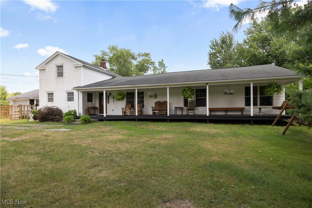 Welcome to this beautifully updated Cape Cod-style home, nestled on a spacious 1-acre lot and offering
the perfect blend of charm, functionality, and flexibility with RB1 zoning, ideal for residential or
commercial use! A long, extended covered front porch welcomes you with timeless curb appeal, perfect for relaxing and enjoying the outdoors. Step inside to an inviting open-concept layout featuring a stunning kitchen remodeled in 2023 with bold blue cabinetry, granite countertops, a large center island, stainless steel appliances (all staying!), and rich wood flooring that flows seamlessly into the expansive great room. The great room impresses with soaring cathedral ceilings, fresh neutral paint, and newer wood floors, an ideal space for gathering and entertaining. The spacious first-floor primary suite (30x18) features vinyl flooring and has been freshly painted in soft neutrals, offering a private retreat. Conveniently located off the great room is a full bath with a step-in shower, large laundry closet with a barn door, and a washer and dryer that were installed just two years ago. Upstairs, you'll find two generous bedrooms, a full bath, and brand-new carpeting throughout. A freshly painted partial basement provides additional storage space. Enjoy the outdoors with a fully fenced-in yard, a deck for entertaining, a storage shed, and garage
storage. The front porch, siding, and roof were all updated approximately 10 years ago for peace of mind. This home is a rare find, charming Cape Cod character with modern upgrades, ample space inside and out, and the added value of mixed-use RB1 zoning. Don't miss your chance to make it yours! Selling as is. One year home warranty included!