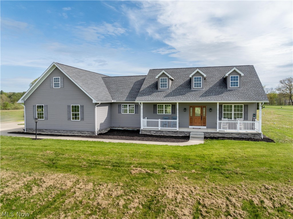 This beautiful custom ranch is just shy of 2000 sq ft, sits on a 2.24-acre lot in Buckeye Schools, and is located on the Shale Creek Golf Course. One-level living at its finest! The open great room has an abundance of natural light, high ceilings, hardwood floors, and access to the backyard. The vast flat backyard is perfect for relaxing outside with friends and family and the covered front porch is perfect for lazy summer nights in your favorite rocking chair. The kitchen features granite countertops, a tile backsplash, GE Slate appliances, an island for extra seating, and plenty of cabinet space. The first-floor laundry is part of the expansive pantry and features ample shelving for storage. Two solid wood barn doors close off the pantry and back bedrooms from the rest of the home for privacy. The impressive master suite includes 2 walk-in closets (5x6), an office or a potential nursery, a private master bathroom with a large vanity with an oversized mirror, and a standing shower with a Corian insert. The main level is completed by 2 generous bedrooms, a hall linen closet, and a full bath with a tub-shower combo. Additional storage space is located in the full unfinished basement which also has an egress window for plenty of light. The oversized attached 2-car garage finishes up this stunning home. Quality throughout with solid wood doors and hardwood floors. Don’t miss this house! Make an appointment for your private showing today!