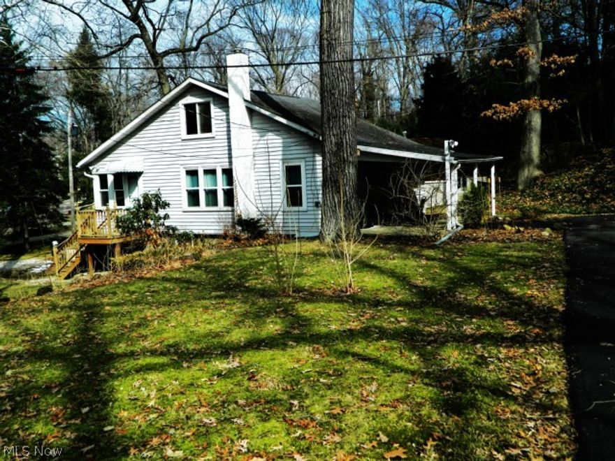 Updated 2 bedroom 1 bath lake view home with lake access on Brady Lake. This home offers 96% efficiency furnace with humidifier & upstairs newer carpet in 2013. Updates in the fall of 2012 include 3/4" hickory wood floors, porcelain floors in the kitchen and bathroom, craft maid cabinet, quartz counter tops, newer stainless steel appliances, sump pump, windows, and electric panel. These are just a few of the upgrades that were completed in this beautiful move in condition home. The upstairs offer a huge master bedroom or a bedroom with a bonus area for an office or sitting area and plenty of attic storage. The basement has a walk out and plenty of room for storage or workshop area. This is a wonderful home for someone looking to live by the lake. The lake is directly across the street for easy access. All you have to do is move in and enjoy!!!