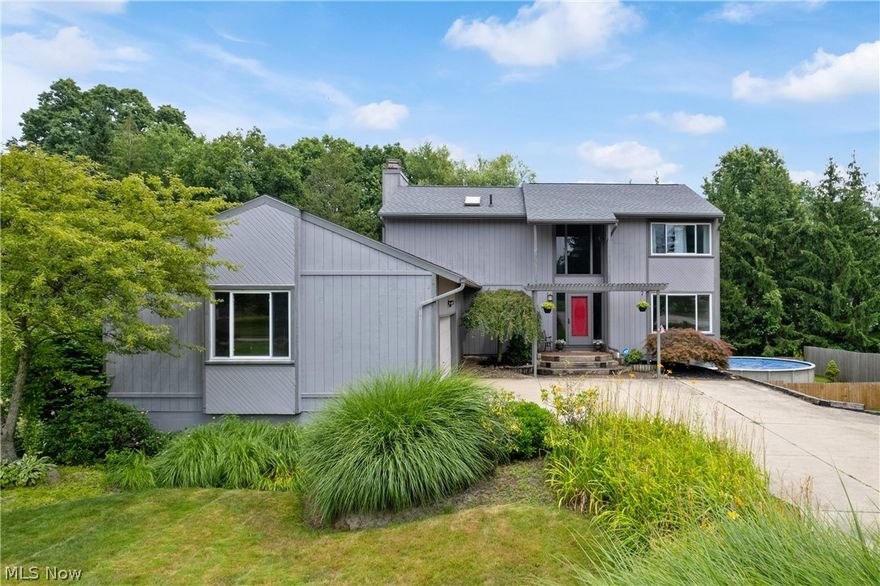 You don't want to miss this opportunity in Revere Local School District! This home appraised for $418,000 in 2023 before all updates! Take a look at this beautifully designed elegant/classic contemporary home located coincidently in a beautiful cul-de-sac on almost half an acre! This home has everything you need and more. When entering the door, you are greeted with a soft white open concept foyer that brings natural lighting to the home. The foyer leads you into the Great Room, Family Room, Eat-In Kitchen (with custom features), and a half bath. Upstairs you will find four well sized bedrooms (all with walk-in closets) and two full bathrooms - one being the master. Both bathrooms feature two sinks. The modern and spacious master bath features a jetted tub, stand in shower, and a full wall mirror. The master bedroom has built in custom dressers and a fabulous walk-in closet! Take a trip down to the basement where you will find a fully finished living area, a second full sized eat-in kitchen (yes, this home has TWO kitchens!), and a full size bathroom! Perfect for guests or even relatives! But don't stop there! Open the door from the basement and enjoy your huge (partially covered) walk-out patio with new outside electricity (2024)! Make sure you take a trip up the outdoor steps to relax on your walk-out deck attached to the Family Room. The newly fenced in backyard (2024) makes for great privacy for your family or friends to enjoy time in your new (2023) above ground pool! With many added features and updates, this home will not last long!