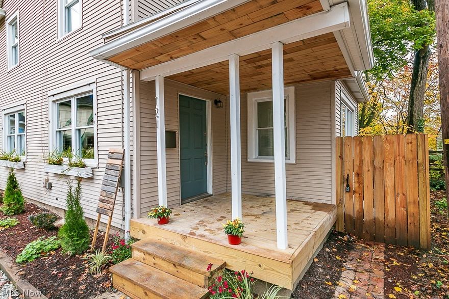 This 4 bed, 2 full bath home is located in a quaint enclave reminiscent of a charming village of long ago, in the Highland Square neighborhood. This classic century home has been reimagined & updated with a nod toward the architectural interest of the era & on-trend finishes. In addition to the newer, double-hung windows throughout the home, you will fall in love with the engineered hardwood floors encompassing the entire first floor.  The fireplace mantel & open shelving in the kitchen are reclaimed wood for that touch of farmhouse chic. The kitchen is open into the dining room with Kraftmaid cabinets, quartz  countertops, Carrera marble backsplash & Whirlpool stainless steel appliances (refrigerator can be added with the great offer).  2nd floor features 3 bedrooms, all freshly painted with today’s most sought after colors & brand new carpet.  The bath finishes include the most Italian tile ~ floor & surround custom vanity with double sinks. 3rd floor is a huge private suite with a d