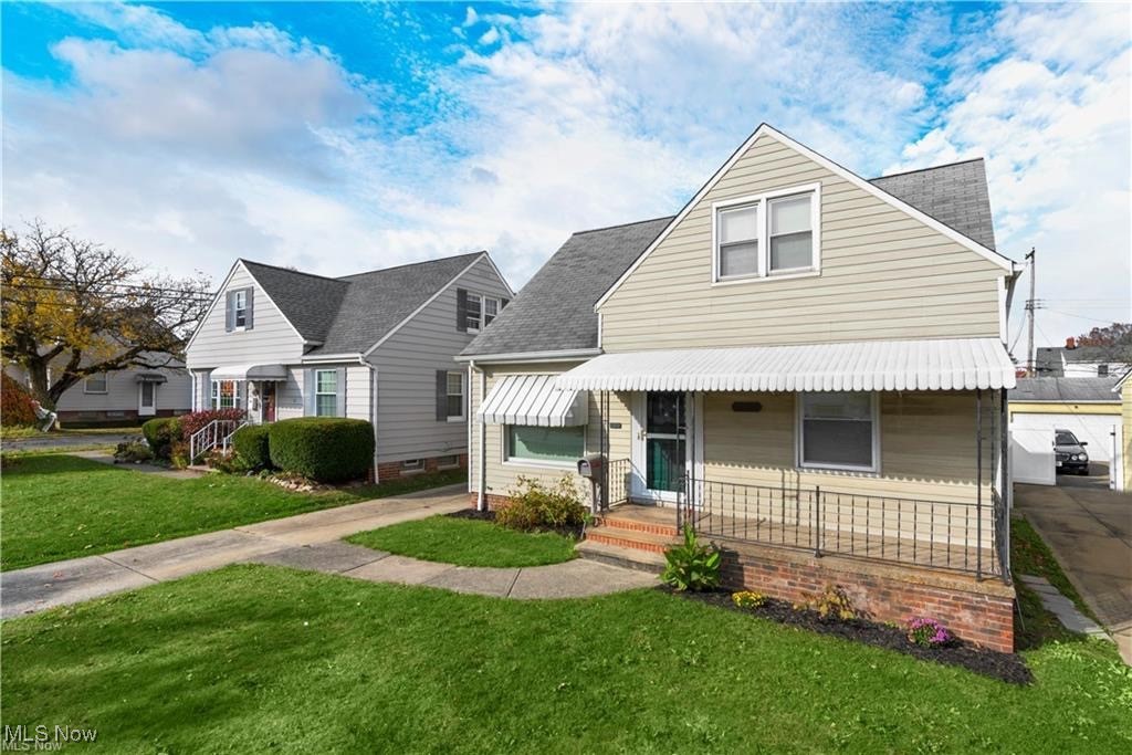 Great Home In The Great Location Of Garfield Heights! Welcome to this charming 3-bedroom, 1.5-bath cape-cod featuring a cozy front porch perfect for relaxing. This home can be perfect as a primary residence or investment opportunity, which is currently receiving $1,449/month in rent, with tenants paying their own utilities on a month-to-month basis (ending October 2025), offering flexibility for investors or future homeowners. The home offers an inviting eat-in kitchen, beautiful hardwood floors, and vinyl windows throughout. The spacious upstairs master bedroom includes a walk-in closet and built-in cabinets for added storage. 
The beautifully maintained basement provides additional living space and a convenient half bath. Freshly painted and well maintained, this home also includes a one-car garage and plenty of room to make it your own. Conveniently located just minutes from the freeway, shopping, and local amenities. Come see all this home has to offer and make it yours today!