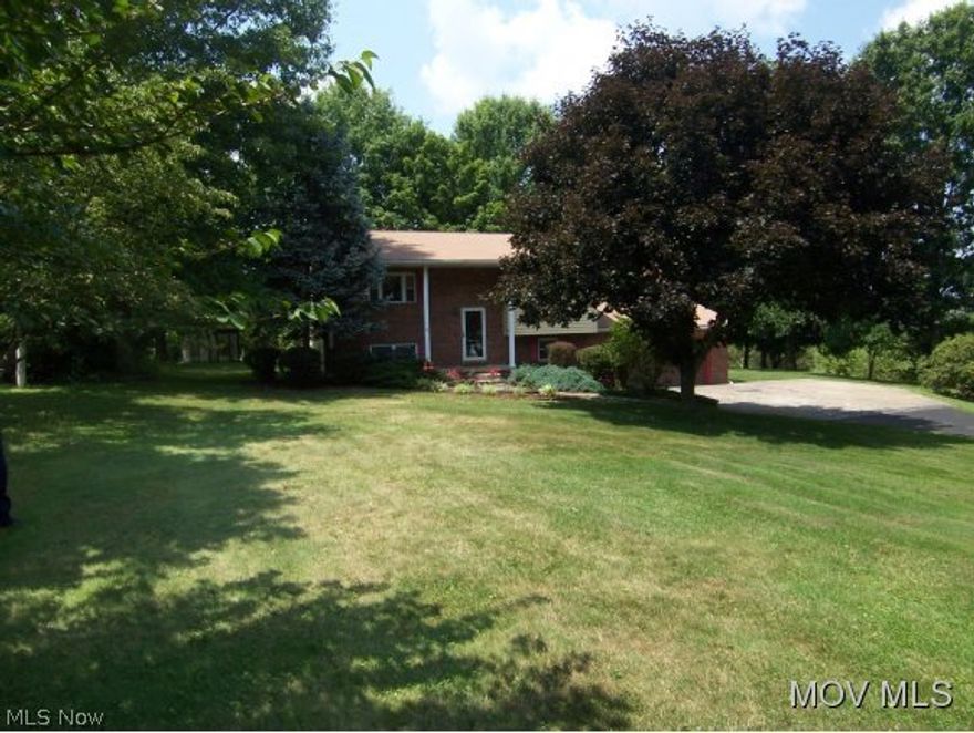 Wanting privacy outside the city? This has it all! Sitting on 1.768 of tree lined beauty, also offering a 40x24 building that is heated, electric, and a dog kennel with a 40x10 dog run.    House with newer roof, and windows.  Bldg. roof 1 yr. old.  Beautiful view from the Florida room. Newer aerator.  Furnace in 2005.  Oversized garage.  Owner is even leaving a riding mower with all attachments.  Elem: Coolville Elementary  Elem/Bus: Y  JrHigh: Little Hocking Middle  JrHigh/Bus: Y  High: Federal Hocking High School  High/Bus: Y  Fire: VOL  Police: SHF  ;SQFT=Fin L1:816, Fin L2:912, Fin Above:1728, Fin Total:1728, Unfin Above:0;GAR= 2 Car Att, Opener(s)