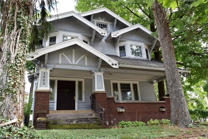 Great CENTURY HOME that sits in a prominent location! Classic hardwood floors and woodwork throughout! This is a GEM in Highland Square! Woodwork is in exceptional condition and rooms are SPACIOUS! Over 2,200 square feet of space in this home built in 1916 - they don't build them like this anymore! 4 Bedrooms, Walk-In Closets, Full height ceiling in the basement, 2 FULL BATHS and Old World Charm! Some new windows on the 2nd floor, so as to not ruin the character and charm of this period of home. Great location with convenient access to downtown Akron, the trendy area of Highland Square with its restaurants, pubs, and shops - as well as convenient access to I-77 - to take you to Cleveland, Medina, Canton.