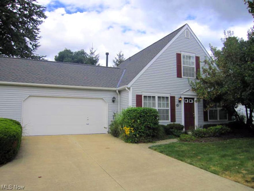 Beautifully appointed Cape Cod offers all the comforts of home and the convenience of easy living. Open and bright floor plan. The sizable living area offers new carpet and fresh paint on first floor. French doors lead to a spacious den w/large closet that could be a 3rd bedroom. Spacious 1st floor full bath w/tub/shower and linen closet. Formal dining room w/sliding glass doors lead to a patio with view of evergreens adjacent to green space and privacy. The full eat in kitchen with new countertops extends off the dining room. The stair case off of the living room leads to a 2nd full bath, master bedroom and 2nd bedroom offering an abundance of closets. Full size laundry/utility room. Furnace and A/C were new in 2012. Roof was replaced in July 2015. 2 car attached garage includes double utility sink, electric opener, service door. Additional guest parking directly across unit. Home warranty provided for 1 year. Association fee includes reserve fund, trash and snow removal, exterior mai