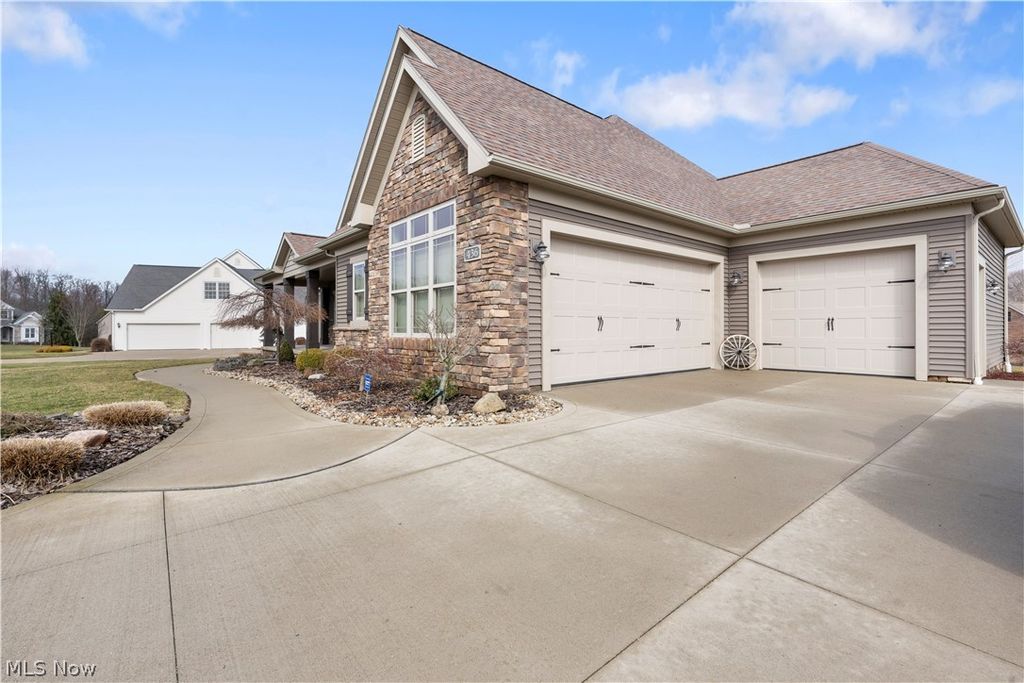 Photo of 436 Heatherby Lane NE, Hartville, OH 44632 (MLS # 5192104)