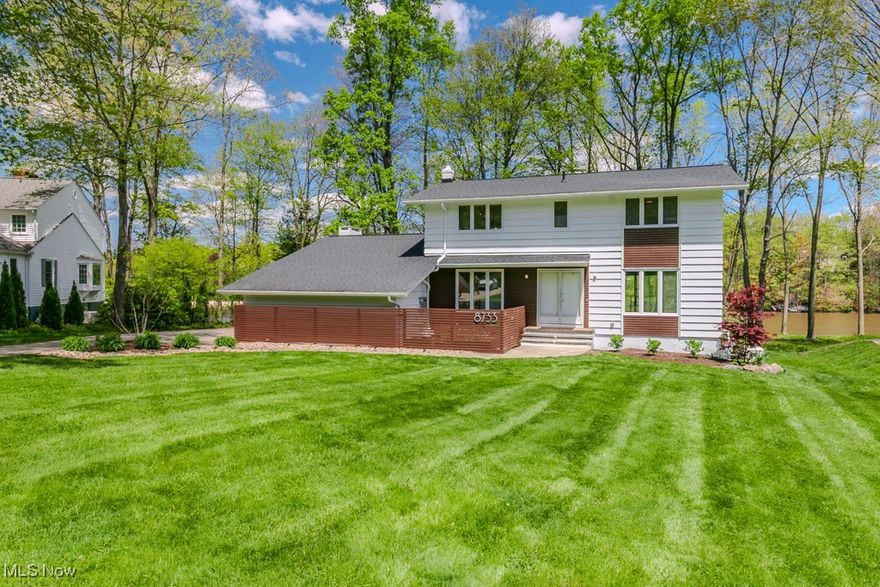 Fantastic contemporary 3 Bedroom, 2.5 Bath lakefront colonial nestled on the largest lakefront lot on Tanglewood Lake.  The main floor is totally open w hardwood floor, perfect for gatherings and enjoying views the lake and large back yard. The Kitchen features an abundance of European style cabinets, high end stainless appliances, and a 10' island with a quartz counter. The remainder of the main floor provides total flexibility for placement of your furniture and Dining table to take total advantage of the views from the large  sliders and windows. Step down through the custom made sliding door to the private Den/Office w hardwood floor, fireplace, built-ins, skylights and a large slider to enjoy the views and access to the Deck. The half bath is on this level as well. The custom stairway leads to the 2nd floor with 3 Bedrooms and 2 full Bathrooms.  The huge Primary Suite with awesome lake views has 2 custom wall closets and a private tiled Bathroom with a large shower.  2 more Bedrooms with custom closets. The back bedroom has a large window to enjoy the lake view as well.  The main Bathroom has been updated with a dual sink vanity & LVT floor.  The lower level has a large Rec Room w LVT floor and a slider to the private covered concrete Patio. There is also a separate unfinished area for the Laundry, mechanicals and added storage. Step out back and relax on the huge 14x56 Deck overlooking the back yard and Lake.  Enjoy your own private beach area and lake access for your lake enjoyment. There is even a treehouse in the back yard!  Recent addition of 16 custom window shades throughout the home provide privacy when desired. Never worry about a power outage with the whole house generator with auto transfer switch.  Entire exterior was painted in May. Tanglewood offers a large private beach and tennis courts for your enjoyment.