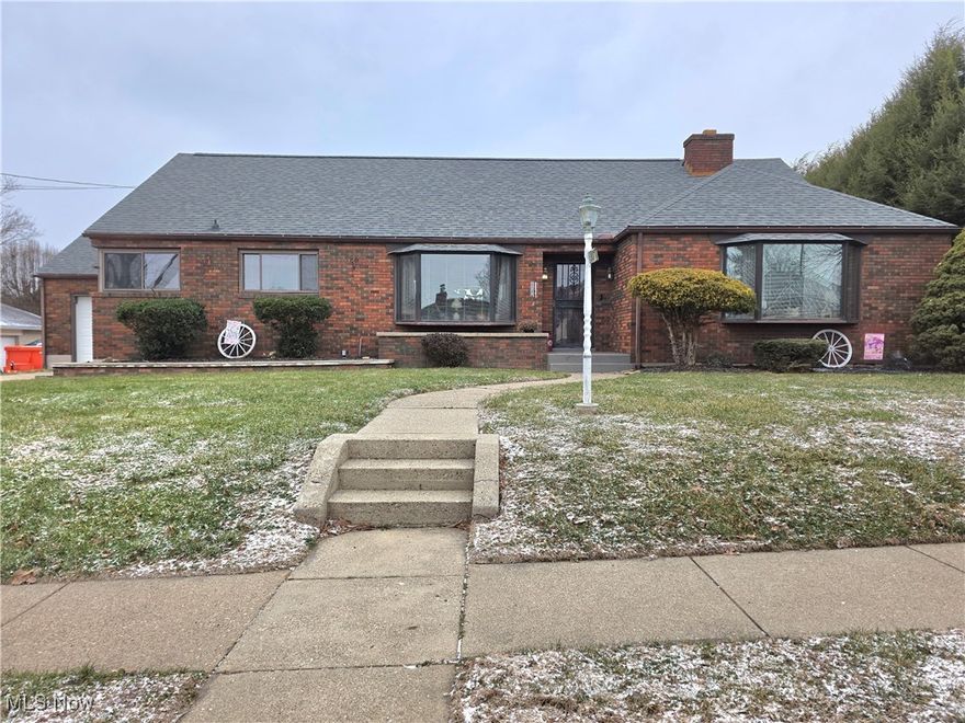 1307 Plum Street, Parkersburg — Charming brick ranch in town! Meticulously maintained 3-bed, 1.5-bath home (approx. 2,222 SF) with one-floor living and a partially finished basement. Highlights include: Ample parking with attached garage plus two carports, Hardwood floors throughout, Newer roof & HVAC; 2024 water heater, New dishwasher; main-floor laundry, Main bathroom with walk-in tub in addition to a half bath in the master suite, Two bay windows, fireplace, formal dining room, Ramps to rear entrance for easy access, and a partially finished basement for extra living or storage space.  This home is move-in ready, and conveniently located near town amenities. Contact for showings or more details.