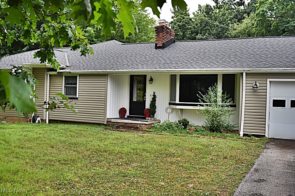 Prepare to be amazed at all this home has to offer! Step into the front foyer and you'll see the wonderful Living Room with large picture window, Fireplace and beamed ceiling. Living Room opens to a back Family Room with sliders to the wooded backyard. Formal Dining Room with built-ins for extra storage is steps away from the amazing HUGE Eat-in Kitchen which was upgraded when the addition to the home was built. Vaulted Ceiling, eat-in area with another slider that leads to the wooded backyard and another wonderful window with views, built-in appliances and tons of storage...plus a large pantry 'area' that gives you even more storage options. There's a second large Great Room off of the kitchen that was being used as an office, but what a beautiful room with a gorgeous picture window and more of those private views. Primary Bedroom with great closet space and Bath are also a part of the addition with vaulted ceilings, soaking tub and separate shower. Small Bedroom is connected to the Primary and hallway for a nursery or small office. 2 more Bedrooms and Full Bath complete this level. Original Bedrooms have hardwood floors under carpeting. Full Basement has TONS of possibility with a 2nd Fireplace area and the step-down basement area from the addition will leave you speechless. Was being used as a workshop but would also have room for so much more! Theater Room, workout room, craft space...the options are endless. Attached 2 car garage has an office with separate entrance or could be used for additional storage if needed. And all of this on a 2.53 ACRE WOODED LOT!!! New Siding in 2025, newer roof and some newer windows. Close to all the amenities that Brecksville has to offer...close to freeways, shopping, entertainment and so much more. Welcome Home to 6522 Mill Road!