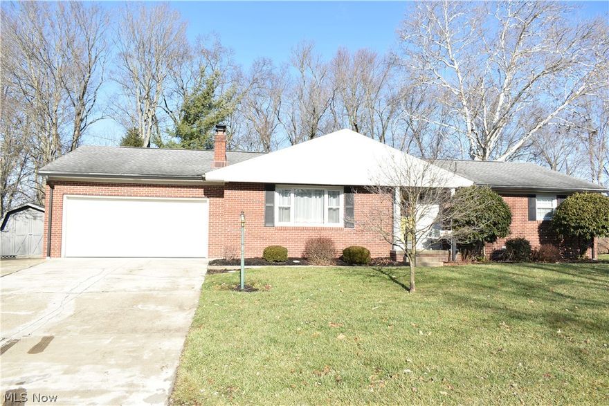 Checkout this nice 4 bedroom, 3 bathroom ranch home with attached extra long 2 car garage, on over 1/3 of an acre lot close to the Coshocton City Schools Campus.  The main level features eat-in kitchen, living room with gas fireplace, dining area, master bedroom with full bathroom as well as 2 other bedrooms and another full bathroom.  The lower level features large family room with gas fireplace and the 4th bedroom with large utility/laundry room with another full bathroom.  The outside is nicely landscaped with a small covered porch off the front and small patio and covered porch off the back.  The back yard is completely fenced in with a chain link fence.  There is wooded area with ravine with water running through it, between the back of the yard and the school campus. The home is nicely decorated and is move-in ready.  Call to schedule a private showing of this home.