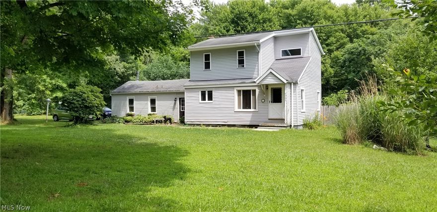 This is your perfect opportunity to rent a unique 2 bedroom/1.5 bathroom home located in Ravenna on 1 acre of land! This home features a gorgeous living room that offers you a rustic feel. Step back in time with this mid century styled kitchen including the appliances that are in great working condition! The dining room features first floor laundry for ease and convenience! The full bathroom is located on the 1st floor keeping with a retro theme! Bedroom #1 is located on the first floor and offers an armoire for storage. 2nd floor offers a spacious master bedroom with plenty of closet space and brand new carpet with a half bathroom. Off of the breezeway is a room that could be used as a 3rd bedroom, guestroom or second family room. This room stays nice and cool in summer months and is comfortable in colder months with the use of a space heater. Basement can be used for storage and there is an additional working tub/shower. Tenant is responsible for electric, cable/internet and landscap