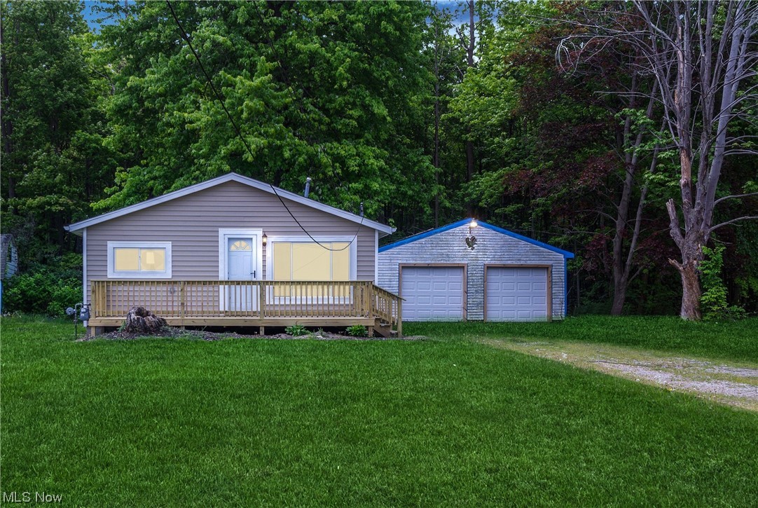 This ranch home has been recently renovated and has a view of Lake Erie. Nice updated kitchen with white cabinets and formica countertop with undermount sink, all new light fixtures, new furnace, new laminate flooring throughout, new doors, windows and roof. Take a look at this home and watch the sunset from the front deck.