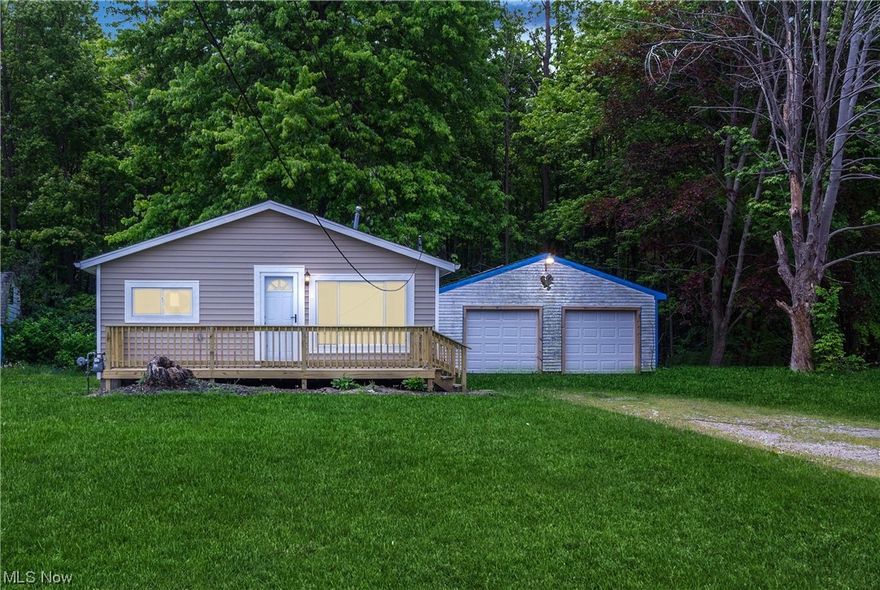 This ranch home has been recently renovated and has a view of Lake Erie.  Nice updated kitchen with white cabinets and formica countertop with undermount sink, all new light fixtures, new furnace, new laminate flooring throughout, new doors, windows and roof.  Take a look at this home and watch the sunset from the front deck.