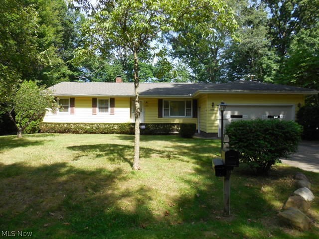 Invitingly priced! This 3 bedroom, 2 full bath homes offers hardwood floors through out most of the home. Nice sized bedrooms with ample closet space. Sliding glass door in dinning room leads to a deck and a large private back yard with shed. A work saving kitchen that offersplenty of cabinets. The family room is highlighted by a brick wood burning fireplace. The basement has a separate storage room with plenty of shelving, a workshop for all your projects, as well as a possible 4th bedroom. ( dishwasher does not work, appliances are a gift to the buyer, however they are not guaranteed!) Seller will not make any Seller will not make any repairs.