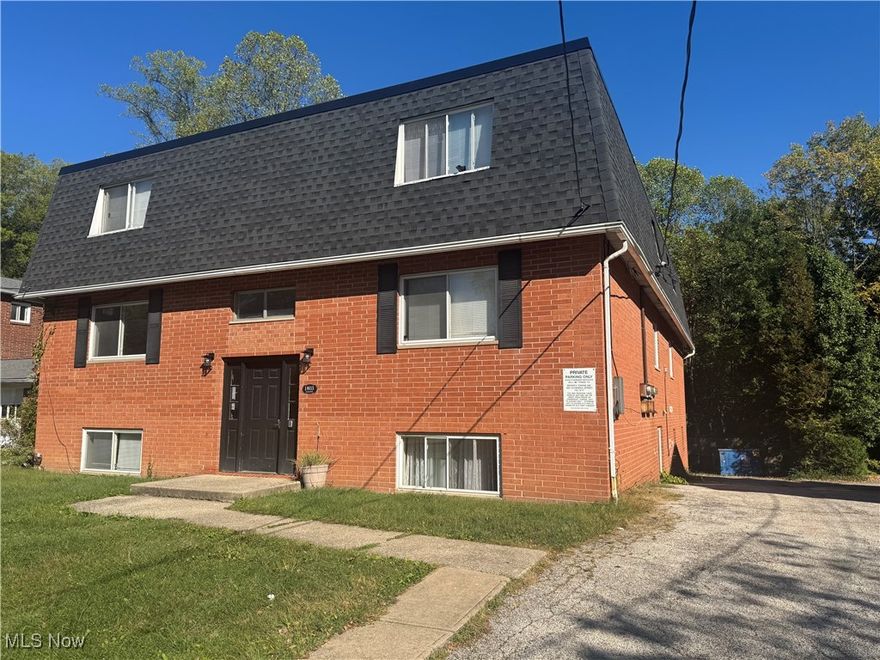 This well-maintained 6-unit apartment building features a mix of two one-bedroom units on the lower level and four spacious two-bedroom units above. The property is undergoing balcony upgrades, with new Juliet-style balconies replacing the existing ones. Each unit offers its own furnace and hot water tank, with central air provided via rooftop condenser units. The building includes a shared, coin-operated laundry area for tenant convenience. Interiors are bright, open, and roomy, enhancing the living experience. The structure boasts a durable brick exterior. Recent roofing work was done to tie  the rim to the shingles nicely.  Tenants enjoy off-street parking behind the building, in addition to attached garage spaces. The property backs onto a serene treed area, offering a bit of natural privacy. With only one unit currently vacant, this is a solid investment opportunity with strong rental potential.