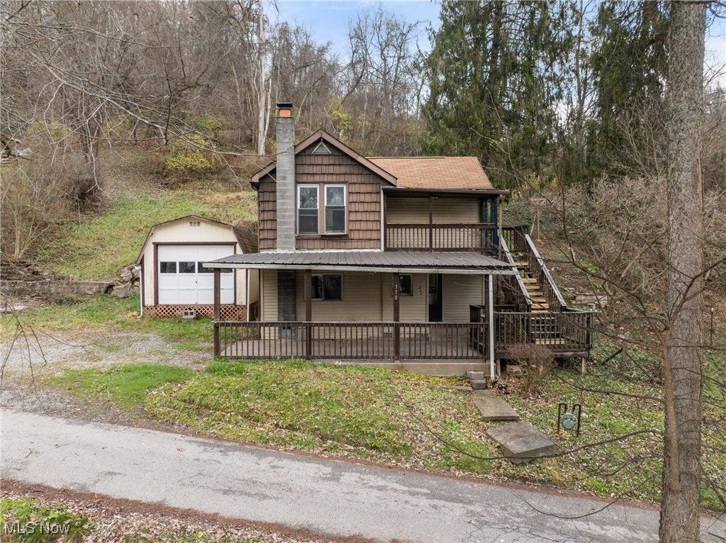 Photo of 710 Cemetery Road, Martins Ferry, OH 43935 (MLS # 5174715)