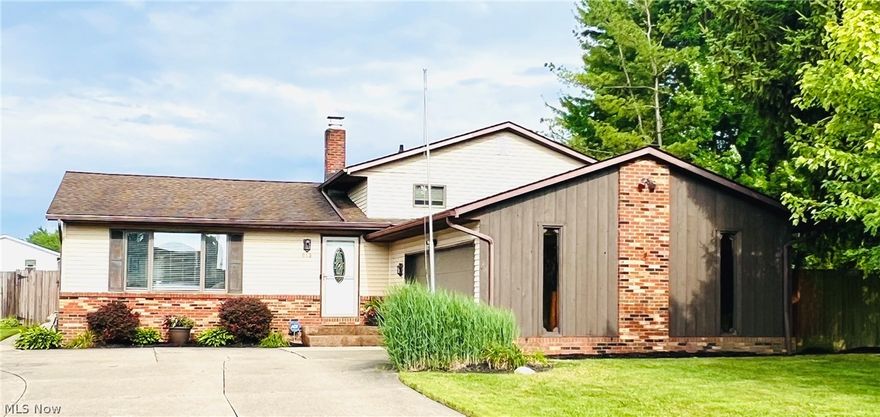 Welcome to this move-in ready, well-maintained split-level home nestled in a quiet neighborhood offering both tranquility and convenience to many restaurants and shopping areas. Built in 1983, this residence blends contemporary charm with thoughtful design elements that enhance its original structure. With four bedrooms and two bathrooms, this home is ideal for people seeking comfort and functionality in a spacious four-level home.

The open area main level connects the living area, dining space, and kitchen. The spacious eat-in kitchen has many cabinets, an island, and newer stainless steel appliances.  Upstairs, the main bedroom offers direct access to the bath featuring a double vanity. Two additional bedrooms on this level provide ample space and privacy.  In the lower level, there is a fourth bedroom, full bath, and  large recreational room, complete with wood-burning fireplace framed by a beautiful brick wall for cozy gatherings on chilly evenings.  The basement level offers additional living space with a bar and convenient laundry area.  

Outside, the patio overlooks a fenced yard and above-ground pool, providing a serene setting for outdoor relaxation and entertaining. The attached garage accommodates two cars and offers additional storage space, complemented by an extra large concrete driveway and garage door opener for convenience and security.

Don't miss out on the chance to make this well-maintained home yours. Schedule a showing today and imagine yourself enjoying the comfort and convenience that this property has to offer.

Some of the updates are:  
- Air conditioning 2018
- Nest thermostat
- Hot water tank 2021
- All kitchen appliances 2017
- New carpet in family room 2021
- Furnace estimated 2012 
- Wi-Fi features with some lights, 
- Ring doorbell, Genie Aladdin 
- Wi-Fi garage opener 
- 27’ Above ground pool and pump 2021
- (To be completed) New roof on back slope main level