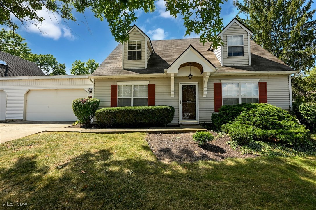 Nicely updated END UNIT in desirable Tinkers Lane Condos! Private, single-family-style living without the exterior responsibilities. Bright and move-in ready, this 3-bedroom, 2-bath home offers a fantastic layout and a prime location in the heart of Twinsburg. The first floor features a spacious living room that flows into the dining area, with a sliding door to the back deck and yard. The galley-style kitchen boasts white cabinets, a charming farm sink, granite-look countertops, and stainless-steel appliances—all of which stay. The washer and dryer will also remain in the utility room, with storage. Pantry and hall closet are conveniently located nearby. One bedroom, with spacious walk-in closet, and main full bath are conveniently located on the first floor, along with laundry and direct access to the attached 2-car garage. Upstairs, you’ll find two more generously sized bedrooms with ample closet space, a second full bath, and a linen closet. Enjoy newer flooring, fresh interior paint, and updated lighting throughout. The HOA includes snow removal, lawn care, roof, siding, exterior lighting, gutter repairs, and more. Conveniently located near shopping, dining, parks, and freeway access. Schedule your private showing today!