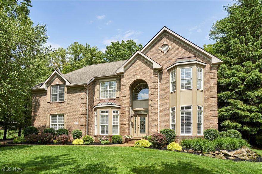 Tucked away on a quiet cul-de-sac in Hinckley’s prestigious Wakefield Run neighborhood, this stunning 4-bedroom, 3.5-bath home showcases thoughtful updates, quality craftsmanship, and serene outdoor living. From the moment you enter, the dramatic stone fireplace in the Great Room draws you in, flanked by a wall of windows overlooking the tranquil koi pond, waterfall feature, and professionally landscaped hillside. The chef’s kitchen is ideal for everyday living and entertaining, featuring granite counters, stainless steel appliances, custom cabinets, a sunny breakfast area, and a slider leading to the backyard oasis. On the opposite side of the home, unwind in the spacious billiards room—also with direct backyard access—or find productivity in the private office. A formal living room and full bath round out the versatile main level. Upstairs, the luxurious Owner’s Suite offers a spa-like retreat with a jetted Jacuzzi tub and walk-in spa shower. Three additional bedrooms, a full bath, and a convenient second-floor laundry complete the upper level. Additional highlights include Pella windows and doors, new Carrier furnace and A/C units, new tankless water heater, new roof, new AprilAire humidifier, and irrigation and security systems. 3-car side-load garage. Located near Michaelangelo’s Winery, Furnace Run Metro Park, Hinckley Lake, and more; this home is a rare blend of privacy, convenience, and beauty. A must-see!