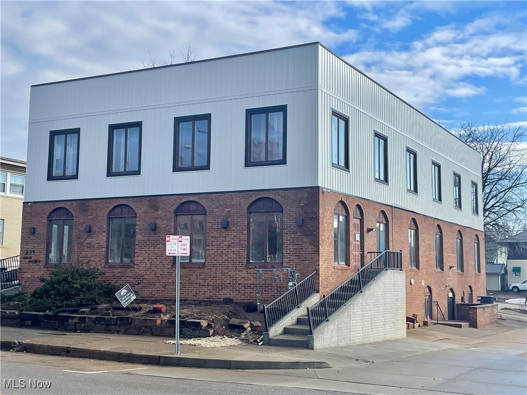 Beautifully remodeled first floor Office or Retail space available for lease in Downtown Wooster. The exterior of the building has recently received an attractive renovation and provides both stairs and ramp access to the building. Tenants will really enjoy the dedicated off-street parking which is rare downtown. The interior has been completely remodeled with fresh drywall, paint, acoustic ceilings, LED lighting, new plumbing fixtures, to include a water fountain and bottle fill station, and offers an abundance of light with window filled exterior walls. This unit is approximately 2,500 square feet consisting of mostly open space, two restrooms, and potential for a private office. Schedule a showing today to see if 231 N. Buckeye Street is the right space for your business. Note: pictures show missing ceiling tiles which will be installed following a final city building inspection.