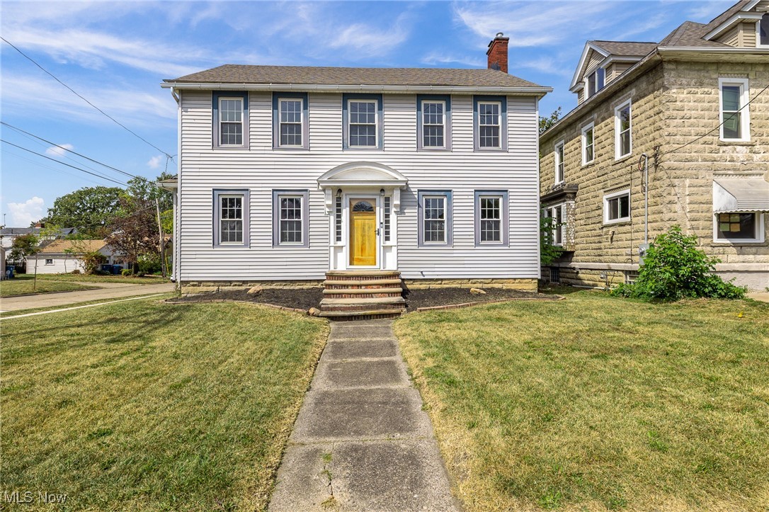 Step into a beautifully restored piece of Lorain’s history—just a 5-minute walk to Lakeview Park and the lakefront beach! Built in the 1840s and once home to noted local architect Henry O. Wurmser, this historic gem blends timeless craftsmanship with modern convenience. Original red oak hardwood floors, handcrafted trim, custom doors, and balusters have all been meticulously restored. The fully renovated kitchen and bathrooms offer high-end finishes and modern functionality, while preserving the home’s classic character. Enjoy multiple outdoor living spaces: a spacious deck, a cozy patio under mature trees ideal for al fresco dining, and vibrant flower beds perfect for gardening. The elevated lot offers partial lake views and a peaceful, private atmosphere. Major updates include new central air, furnace, plumbing, and electrical—providing the comfort of new systems while maintaining historic charm. The seller is also open to remodeling the second on-site structure to the buyer’s specifications, and can install a new garage and driveway at additional cost. Seller concessions available. This property is registered with the Ohio Historical Society (#LOR 756-16), but does not require their approval for remodeling—offering both historic value and flexibility. Don’t miss this rare opportunity to own a landmark property steps from Lake Erie! The property also comes with a TEN YEAR REAL ESTATE TAX ABATEMENT.