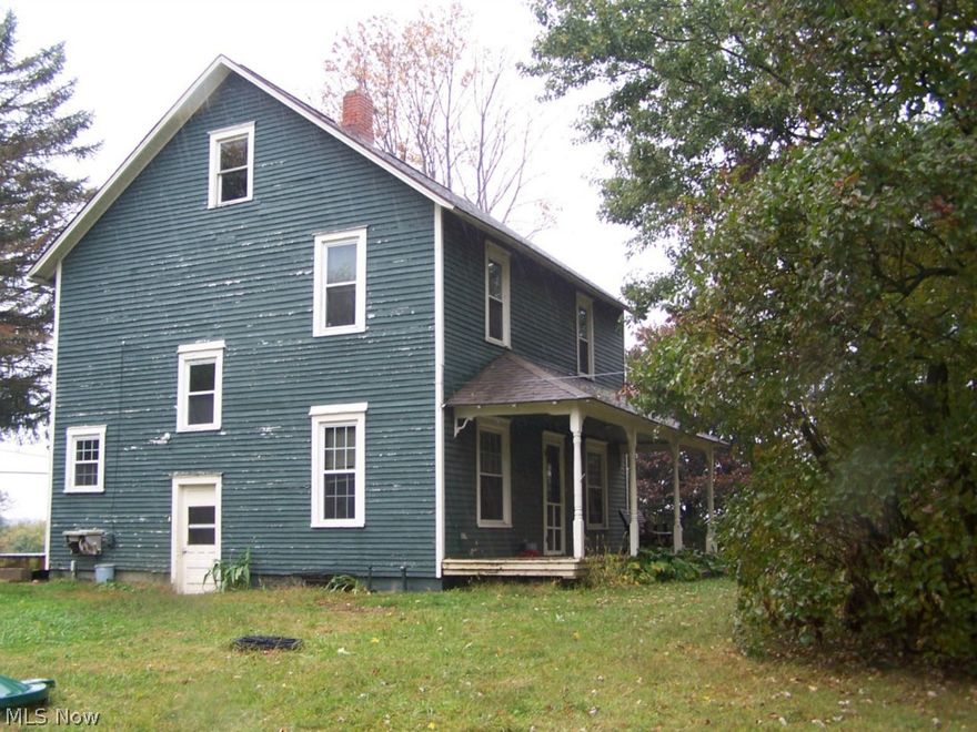 Just needs a little TLC!  Bring your paint brush and new carpet and you can turn this into an adorable home!  Great treed setting overlooking ravine on 3+ acres. Very quiet peaceful setting.   Newer 24x24  2 car detached garage with concrete floor and separate electric.  Many updates in last 15 years, including new roof, septic, windows, electric. Mineral rights do not transfer.