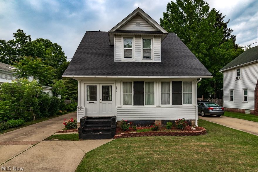 A Painesville Classic riddled with old-world charm waiting for your creative touch. The grounds and concrete driveway have been well maintained and offer great value. As you pull up the drive notice the classic barn-style oversized garage that lends itself to many unique possibilities. As you enter the home focus on the detailed woodwork that has amazingly remained unpainted, exhibiting expert craftsmanship from a very special time. The kitchen will certainly need some updating, but the exit door leading to the backyard deck lends itself to amazing opportunities to entertain and outdoor dining.  Both the dining room and living rooms are larger than you might expect and would welcome an oversized dining table or sectional sofa. The home also has a hidden treasure with hardwood flooring waiting to be exposed!  The foyer below the red oak staircase affords the space to greet guests as they enter the residence. As you walk up the stairs take the time to admire the wonderful detail in the h