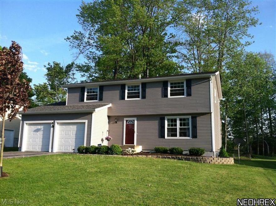 The PRICE has been REDUCED on this move-in ready 4 bedroom, 2.5 bath residence located in a quiet neighborhood near the park and bike trail. Highlights include remodeled kitchen & baths, formal living & dining rooms and a spacious master bedroom with dressing area & bath. The private backyard features a large deck and mature trees. This home also has a newer roof, vinyl siding, windows, furnace, AC and much more. If you're looking for a home that is UPDATED inside & out while being move in ready this is the ONE! Land Contract Terms Available. Call for Details.