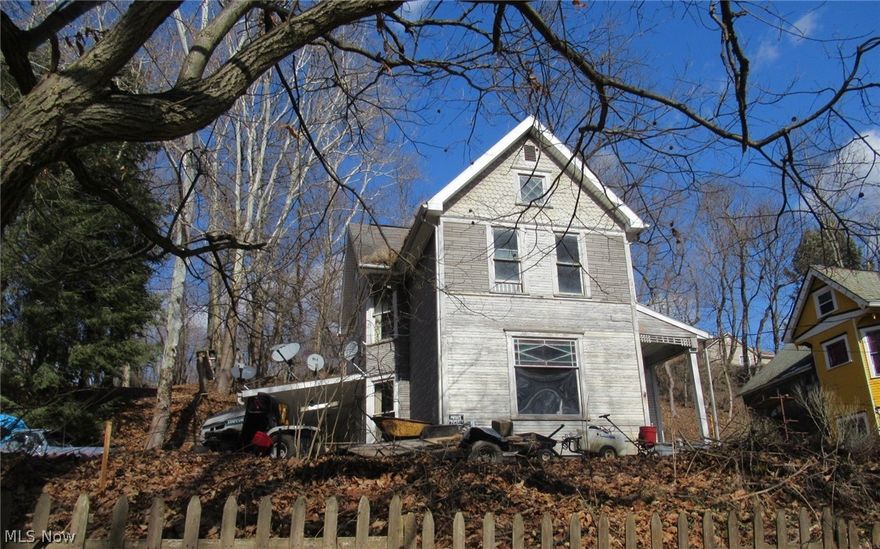 Are you looking for your next project or your next fix and flip...then come check out this large 2 story overlooking Salineville. Bring your imagination and your tool belt and make it a reality. Sold as-is.