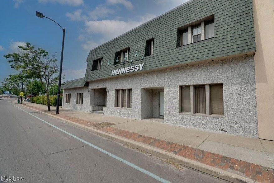 This 10,000+ sq ft building is currently being used for a long-time family-owned funeral home. Tastefully decorated and updated large open areas with 3 individual offices or others. All one level, plus men's and women's private bathrooms. Two apartments upstairs that are not currently occupied. Partial basement, and this building includes parking for 30+. In addition, there are other parcels that are included in this amazing price. Many possibilities for different businesses. Minutes from downtown Akron 

Parcels included are : lots: 534 N. Main St #550 (68-57068) Lot -17 x 141, 534 N. Main St (68-25668) 64 x 141, 534 N. Main St (68-25657) 42 x 121, 549 Blaine Ave (68-25673) 74x172 

552 N. Main St has the only building of 10,171 sq ft, which is a long-standing funeral home (68-25672) 45 x 83 

Sale includes the following lots: 534 N. Main St #550 (68-57068) Lot 17 x 141, 534 N. Main St (68-25668) 64 x 141, 534 N. Main St (68-25657) 42 x 121, 549 Blaine Ave (68-25673) 74x172 

552 N. Main St has the only building of 10,171 sq ft, which is a long-standing funeral home (68-25672) 45 x 83