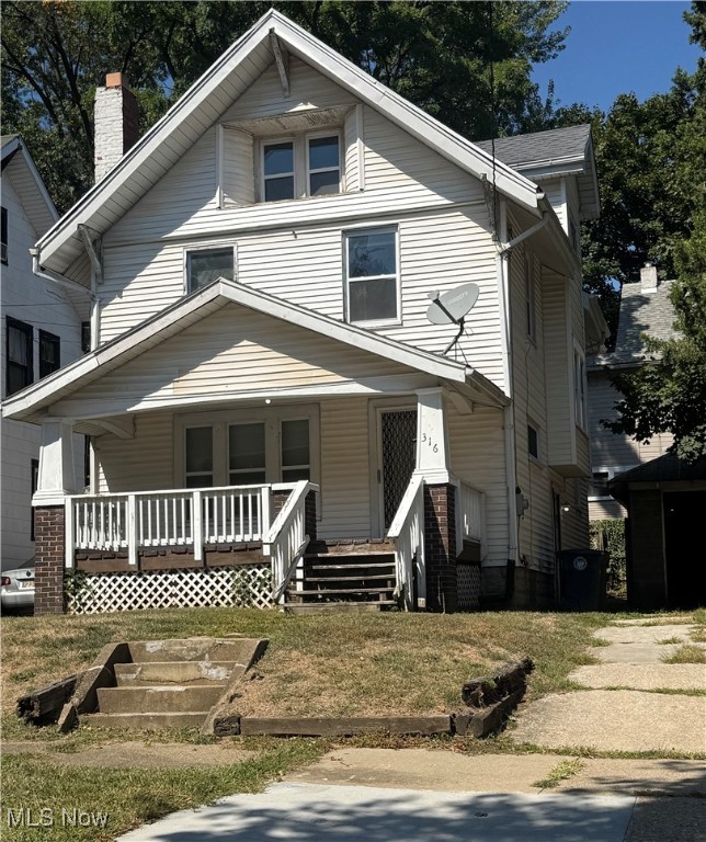 Welcome to 316 Grand Avenue! This beautifully updated colonial in Akron's desirable Highland Square neighborhood offers just over 1,500 square feet of living space with 3 bedrooms and 2 full baths. Outside you can enjoy a spacious corner lot located across the street from a church, a one car carport, a fenced in back yard, and a large covered front porch that is perfect for relaxing. Almost every window in this house has been replaced and the carpet in the majority of the home was replaced in 2024. You’ll love the beautiful original woodwork throughout the home, adding timeless character and warmth, and the large living room is the perfect spot for relaxing, featuring a stunning brick fireplace for cozy evenings. The basement was just waterproofed in the summer of 2025 and there is a washer and dryer hookup with plenty of extra storage space. The third floor features a fantastic bonus room that can easily be transformed into a fifth bedroom, a recreation room, or whatever suits your needs. Conveniently located close to shopping, dining, and all that downtown Akron has to offer, don't miss out on your chance to call this home yours. Schedule your showing today!