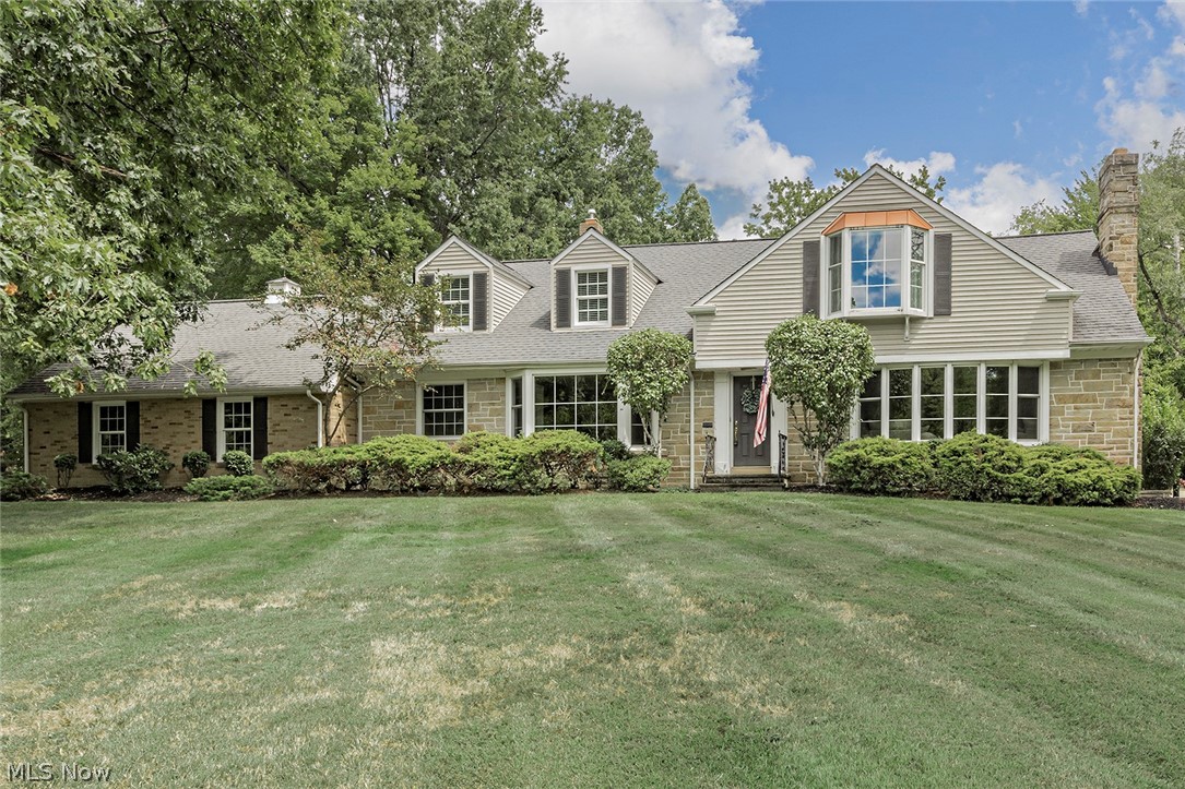 This One of a kind charmer, 5 Bedroom Cape Cod home is located in the Beautiful Lyndhurst Park Estates. It sits on a sprawling 1.3 Acres with much privacy. The remodeled Galley kitchen includes stainless steal appliances with Quartz counters with Porcelain backsplash tile. It also includes a pantry, beautifully hidden behind the custom made "Barn Doors". As you move from the Kitchen you enter into the "Pub" Style Dining area. The larger Family room flows directly from the dining area, with ample space to entertain. Throughout this gem, you'll notice the beautiful crown molding which adds such character. If you enjoy the outdoors, you will love the large stamped concrete patio surrounded by greenery for privacy. A must See! Where city meets the Country!