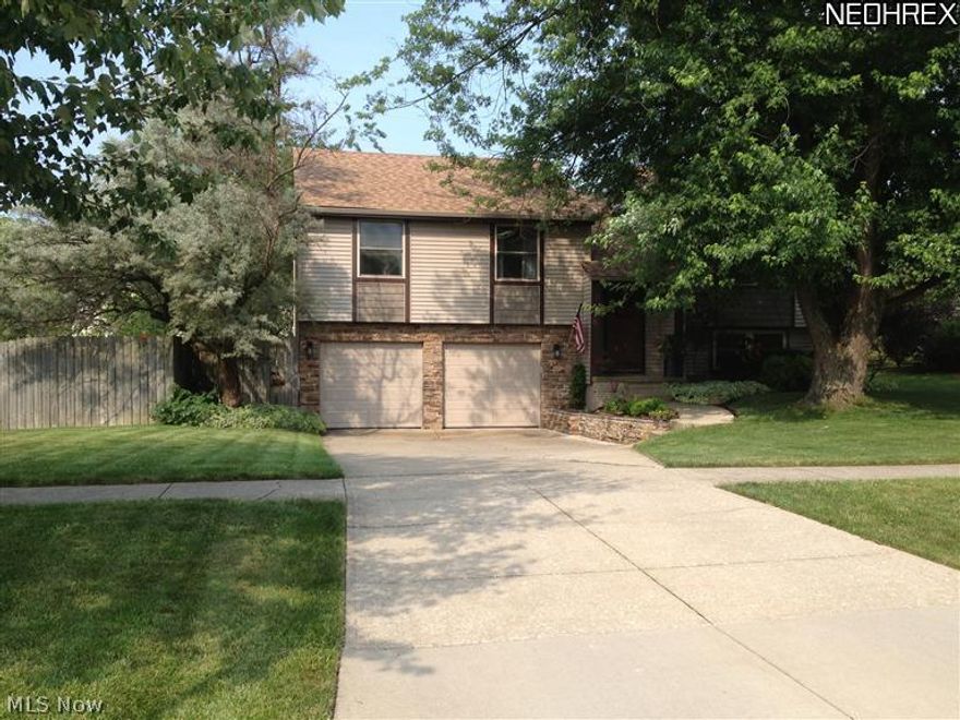 This beautiful 4 Bedroom, 2.5 Bath bi-level has been recently updated. Vinyl siding installed this summer, new roof in 2009. New Windows, Furnace, central air and whole house humidifier also added. Main floor has the living room and 3 Bedrooms, a nicely decorated bright kitchen and dining room that leads off to the backyard deck. On the lower level is the Family Room with wood burning fireplace, the 4th Bedroom, half bath and laundry room. A nice sized deck and landscaped patio, a 10 x 10 storage shed, and the 6 foot high privacy fence surrounding the entire back yard - this home is ready for great indoor and outdoor entertaining! Conveniently located to development pool, parks and walk/bike trails. More photos to come.