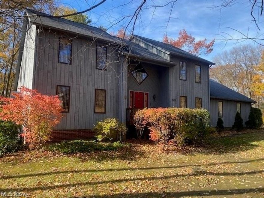 Located in desirable Greenview Estates in Aurora, this cedar-sided colonial sits on a beautiful 1.52-acre wooded corner lot. Enjoy outdoor living with a spacious deck and gazebo—perfect for entertaining and relaxing while overlooking the private backyard.
Step inside the dramatic cathedral foyer that leads to a formal living room and elegant dining room with a tray ceiling. The inviting family room features a fireplace and wet bar, creating a great space for gatherings. A bright four-season garden room with skylights and walls of windows offers peaceful views of the backyard year-round.
The Kitchen is the heart of the home includes a center island with cooktop and seating, abundant cabinetry, plenty of workspace and corner desk area. A convenient first-floor laundry room with storage closet adds everyday functionality.
Upstairs you’ll find four bedrooms, including a spacious primary suite with a private bath featuring a Jacuzzi tub and walk-in shower. One of the additional bedrooms includes built-in bookcases and a spiral staircase leading to a charming loft space.
Additional highlights include a 4-car garage and a scenic wooded setting in one of Aurora’s most sought-after neighborhoods. Conveniently located near freeways and turnpike. Truly a must see!!!