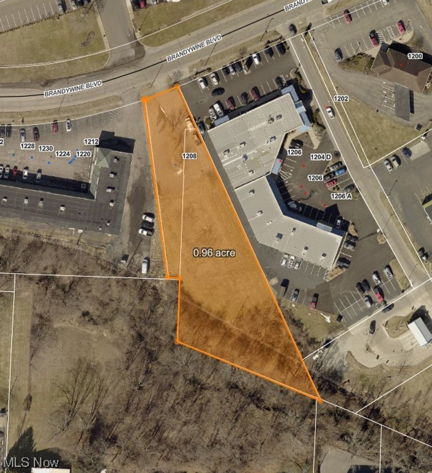Public utilities and a high traffic location make this an ideal location for your new or existing business. This almost one acre site is level and partially paved with parking lot. Just off Maple Avenue.