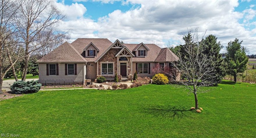 Welcome to Blue Ridge Estates! This elegant, sought-after ranch style home on a serene, private 2-acre property.  This custom, 4-bedroom, 3 full bath home exudes warmth, quality, and comfortable elegance. Architectural features abound starting with an inviting covered entry leading into a stunning, open-concept floor plan. The kitchen is centrally located and serves as the focal point with distinctive spaces. It is well-appointed with new kitchen SS appliances (12/2023), café-style bar seating, a walk-in pantry, and open views to the great room, dining area, and 4-season sunroom. Great room w/gorgeous hardwood floors, floor to ceiling stone wall with gas-log fireplace, and private rear yard views. Sophisticated open dining area with wall sconces and tall ceilings leads to the light-filled 4-season sunroom with a cathedral ceiling, and expansive windows. A flex space for a home office, library or reading nook is offered near the great room with a curved archway and columns. The primary bedroom suite is split from the other bedrooms for privacy and includes an adjoining sitting area, separate walk-in closets, and an ensuite bath with 2 vanities/sinks, separate shower and 5’ jetted tub tucked away in a private bay window area. Bedrooms 2 & 3 share a hall full bath & bedroom 4 has a hall full bath. A laundry room completes the main level. Below is an extra-large unfinished basement with unlimited possibilities. Outside is a welcoming, generous, well-groomed rear yard with lovely entertainment spaces including a large deck, brick paver patio, and covered sitting area and firepit. The home also has a large 3-car side load garage. Recent (since Dec. 2023) updates include: a new septic system, radon mitigation system, kitchen appliances, chimney cap, recessed can lighting in hall/kitchen, kitchen hardware and chandelier, carpet & air duct cleaning, bathroom faucet, security system, & select painting.