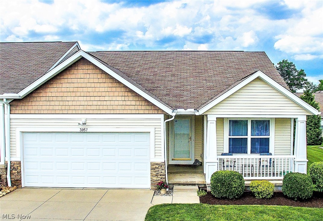 ** Beautiful Low Maintenance One Owner Ranch W/2 Bdrms, 2 FULL Bathrooms, A Huge FULL Basement, 2 Car Attached Garage, Deck, Front Covered Porch & Walkway In Brittany Commons Of Lakemore Twnshp! *Rare - One Of The Only Condos For Sale Providing A Full Basement! *Vaulted Ceiling Great Room, Foyer And Master Bdrm! * Vinyl, Shaker Style Siding W/Stone Accents For Great Curb Appeal *Dedicated 1st Floor Laundry Room W/Storage Closet & In Room Shelving. Washer & Dryer Stay * Walk In To A Foyer And View Of The 13'5" Vaulted Ceiling Great Room W/Gas Fireplace! The Great Room Provides Great Space So It Can Be Divided Into An Office/Extra Dining If Wanted For Family Gatherings! *The 22 Ft. Long Eat In Kitchen Has Sliders To The Back Deck And Is Semi-Open To The Great Room *Fully Applianced With Refrigerator, Gas Stove, Dishwasher, And Microwave, Flourescent Lighting And Great Cabinet/Countertops! *Master Bdrm W/Ensuite Master Bath And A Walk In Closet!! *The 2nd Bdrm Has An Adjacent Full Bathroo