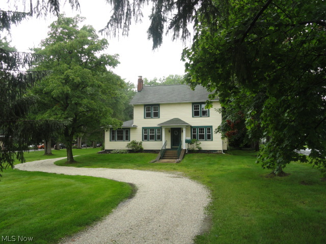 This charming 4 bedroom, 2 bath Colonial sitting on a beautiful .9 acre lot is zoned residential/business and can either be a single family home, a home with a business too or just a business! Step into the formal living room with wood burning fireplace and windows across the back allowing plenty of sunlight. Formal dining room with vintage built in shelves. (living and dining rooms have hardwood floors under the carpet!) Cozy first floor family room or office with separate entrance!! Spacious eat in kitchen plus 1/2 bath. Addition with vaulted ceiling and loft connects to the 2 car garage. Bedrooms have hardwood floors plus a staircase to the 3rd floor attic. Solid built and maintained with great care. Walk to the coffee shop, restaurants, library or grocery store! Enjoy the huge backyard with a garden or a game of kickball! Benefit from the excellent rated Stow school system too!
