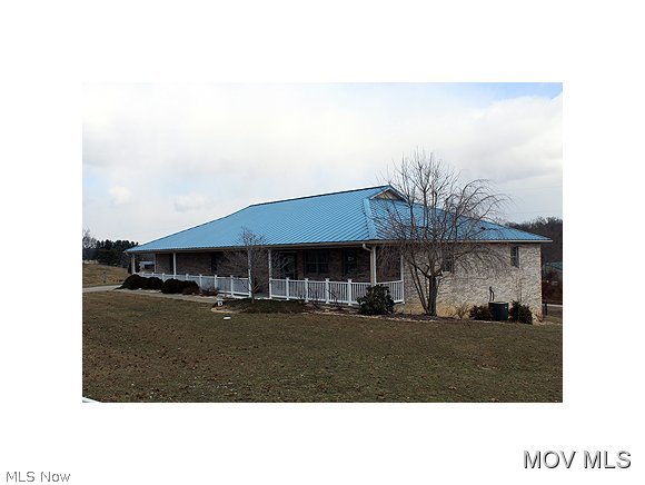Equestrian dream...this beautiful property offers it all. A gorgeous brick ranch home w/an open floor plan perfect for entertaining family & friends. Quality built throughout w/custom hickory cabinetry, dbl wall ovens, all appliances, large spacious rooms with trey ceilings, all handicap accessible with great porch/deck area overlooking steel 85 X 110 barn/ heated stable, indoor riding arena & heated RV storage/horse trailer area all on 5 acres with fenced pasture and chain link area for a dog. 3 car heated attached garage, poured wall unfinished basement, and back up generator.A must see! Elem: Barlow-Vincent Elementary Scho Elem/Bus: Y JrHigh: Warren Middle JrHigh/Bus: Y High: Warren High School High/Bus: Y Fire: VOL Police: SHF PossFreeGas: N ;SQFT=Fin L1:2226, Fin Above:2226, Fin Total:2226, Unfin Bsmt:2226, Unfin Above:2226;GAR= 3 Car Att, Heated, Opener(s);PRKG= Off Street, RV Parking