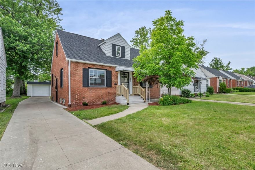 Looking for fully renovated, modern living with nothing to do but move in? You have found it. Welcome to Parkton Drive, a stunning Cape Cod in the desirable Lee Gardens neighborhood of Warrensville Heights. This move-in-ready home offers 3 bedrooms, 2 beautifully updated full bathrooms—including a spacious LUXURY master ensuite —along with a bright, open-concept living space, perfect for entertaining. From the moment you enter the door, you will love the refinished hardwood floors greeted with warm colors throughout the home. The kitchen has brand new white cabinetry and stunning quartz counters, including a new microwave and dishwasher! The first floor also offers 2 nice sized bedrooms with spacious closets. The main bath is beautifully finished with a lovely grey tile throughout. Upstairs, is the amazing master bedroom with a huge closet and ensuite bath. This bathroom is sure to amaze with its exceptional design. The walk-in shower offers multiple accessories including a rainfall shower attachment, but the glossy tile is the real showstopper! The finished basement also offers so much room for entertaining on game day with its own bar! Nearly every detail has been thoughtfully renovated, including a brand-new roof, central air conditioning, HWT (2024), modern fixtures, LVP flooring, and freshly painted all through. Outside, enjoy a charming, easy-to-maintain yard and a 1-car detached garage. With its classic brick curb appeal, fresh updates throughout, and a convenient location near schools, parks, shopping, and highway access, this home is the perfect blend of comfort, style, and value. Don’t miss your chance to see it—schedule your tour today!