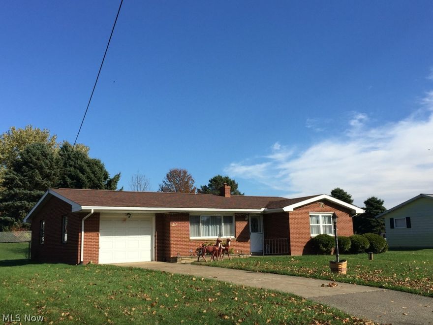 Solid full brick ranch with 3 bedrooms and bath on the main floor. 1 car attached garage. Eat-in kitchen, covered back patio, and fenced yard. New roof, chimney cap, and down spouts in 2014. Basement access thru the garage. Basement with fireplace and full bath. Replacement windows. Large lot with .34 acres. Same owner since 1962. New drilled well in 2014. Electric: $115/month.