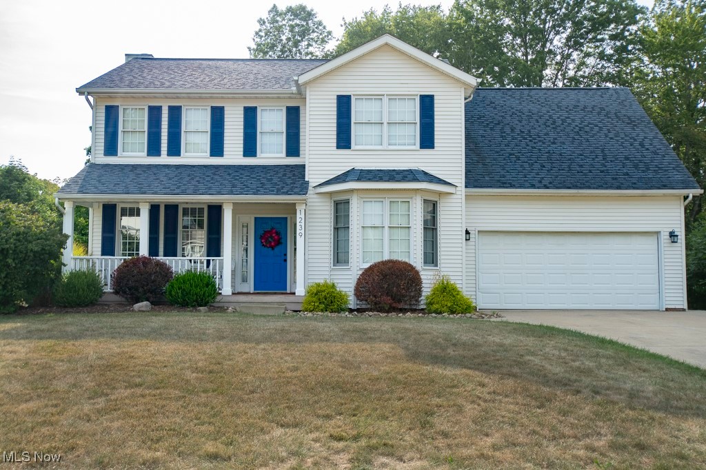 Welcome to 1239 Glenoak Drive nestled in the highly sought after Tallmadge Hills neighborhood. This beautiful colonial offers 4 bedrooms, 3.5 baths, and 2,160 sq. ft. of above-ground living space, plus an additional 766 sq. ft. of finished walk-out basement (total of 2926 Sq ft) all situated on a desriable corner lot just under a half an acre.
The foyer greets you with hardwood flooring and opens to an inviting office/den with French doors on one side and a spacious dining room with bay windows and tray ceilings on the other. Step into the comfortable family room highlighted by large windows and a cozy gas fireplace. The open-concept kitchen (19x15) offers plenty of cabinets, an island, and room for a breakfast table. A first-floor laundry room and half bath offer added convenience and functionality.
Upstairs, the primary suite boasts tray ceilings, a large walk-in closet, soaking tub, shower, and an additional storage/closet space. Three more bedrooms, a full bath, and a 20x14 bonus room (perfect as a 5th bedroom, playroom, or media room) complete the second floor.
The finished lower level adds 766 sq. ft. of living space with a 24x18 rec room, walk-out access, an additional office/craft room, and a full bathroom.
Outdoor entertaining is a dream with a 20x20 rear deck and a pathway that leads to a fire pit. You'll find plenty of storage in the outdoor shed and two car garage with extra depth. The covered front porch also offers a cozy place to relax.
Don't miss this opportunity to own a spacious, well-cared-for home in the sought-after Tallmadge Hills community!