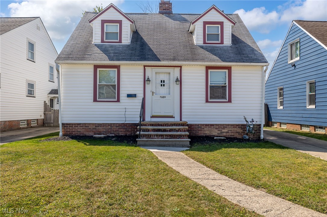 **Welcome to 7609 Wooster Parkway -- Classic Charm Meets Modern Updates!** This beautifully maintained 1½-story Cape Cod in Parma offers timeless character with thoughtful upgrades throughout. The spacious living room features hardwood floors, crown molding, and a decorative fireplace with dentil molding on the mantel. An adjacent enclosed back porch faces south and provides a cozy spot to relax with backyard views. Most rooms include hardwood floors and charming decorative arches. The updated eat-in kitchen boasts tile countertops, soft-close cabinets, a deep stainless-steel sink, pendant lighting, undermount lighting and newer stainless-steel appliances. The stove has an air fryer feature. There are also pull-out drawers, a deep drawer under sink, built in cutting board and a spice cabinet/closet. There is also a flexible dining room with built-in china cabinets that can serve as a home office or third bedroom, and a convenient half bath completes the main level. Upstairs are two generously sized bedrooms -- one with a private porch -- and a remodeled full bath with a stand-up shower, wainscoting, and vintage wood-look tile. The partially finished basement adds living space with a rec room, laundry/utility area, glass block windows, and ample storage. Convenient motion sensor lights by back door for safety and convenience. Nice to have a bathroom on every floor. Major updates include a new furnace (2024) and hot water tank (2019), with central A/C easily added. A spacious 2+ car garage and convenient access to shopping, dining, highways, Metroparks, and the airport make this move-in ready gem a must-see!