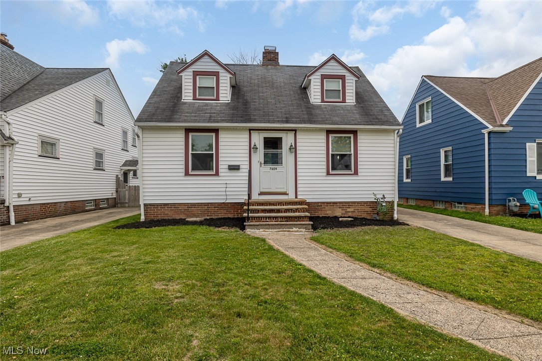 **Welcome to 7609 Wooster Parkway -- Classic Charm Meets Modern Updates!** This beautifully maintained 1½-story Cape Cod in Parma offers timeless character with thoughtful upgrades throughout. The spacious living room features hardwood floors, crown molding, and a decorative fireplace with dentil molding on the mantel. An adjacent enclosed back porch faces south and provides a cozy spot to relax with backyard views. Most rooms include hardwood floors and charming decorative arches. The updated eat-in kitchen boasts tile countertops, soft-close cabinets, a deep stainless-steel sink, pendant lighting, undermount lighting and newer stainless-steel appliances. The stove has an air fryer feature. There are also pull-out drawers, a deep drawer under sink, built in cutting board and a spice cabinet/closet. There is also a flexible dining room with built-in china cabinets that can serve as a home office or third bedroom, and a convenient half bath completes the main level. Upstairs are two generously sized bedrooms -- one with a private porch -- and a remodeled full bath with a stand-up shower, wainscoting, and vintage wood-look tile. The partially finished basement adds living space with a rec room, laundry/utility area, glass block windows, and ample storage. Convenient motion sensor lights by back door for safety and convenience. Nice to have a bathroom on every floor. Major updates include a new furnace (2024) and hot water tank (2019), with central A/C easily added. A spacious 2+ car garage and convenient access to shopping, dining, highways, Metroparks, and the airport make this move-in ready gem a must-see!